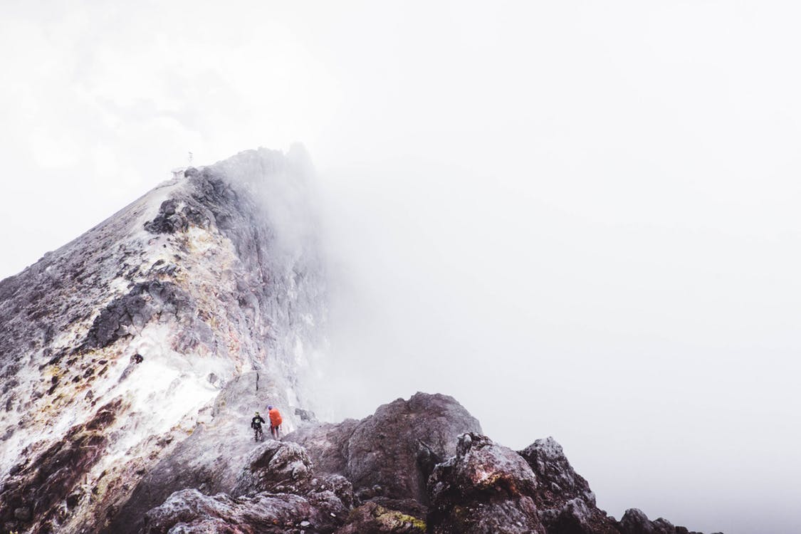 Two people on a mountain