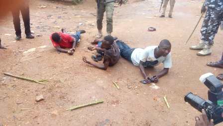 Pictures of the man arrested by police for possessing clone cards and others arrested for wandering around polling zone.
