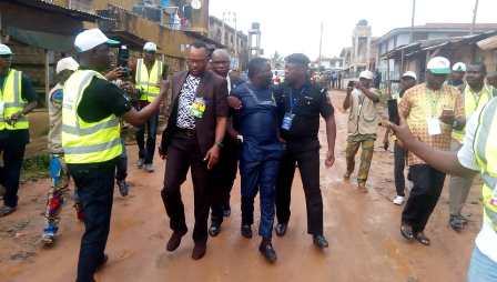 Pictures of the man arrested by police for possessing clone cards and others arrested for wandering around polling zone.