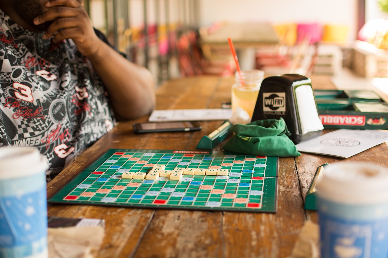 person playing board game